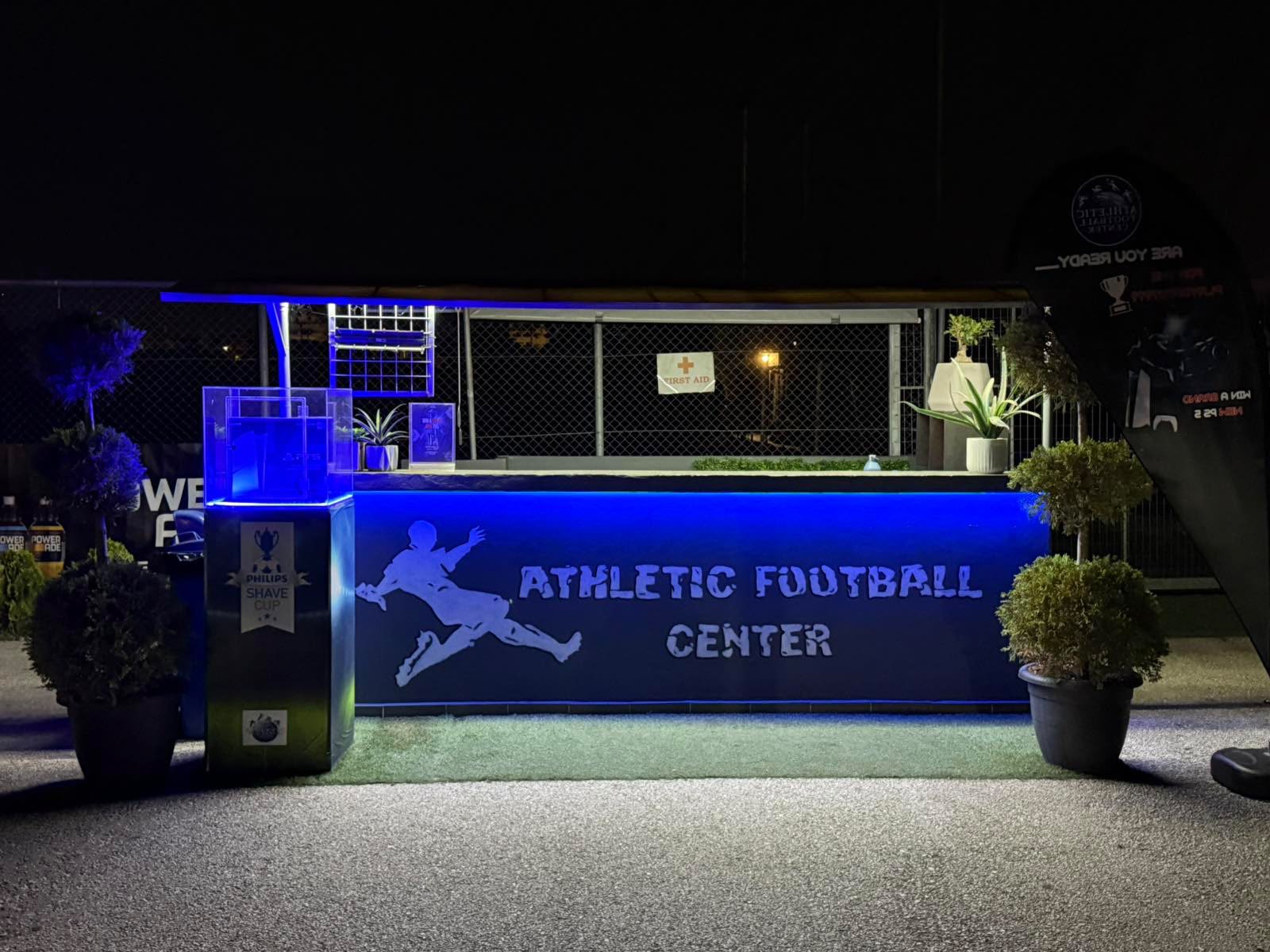 Reception desk lit up before an evening tournament